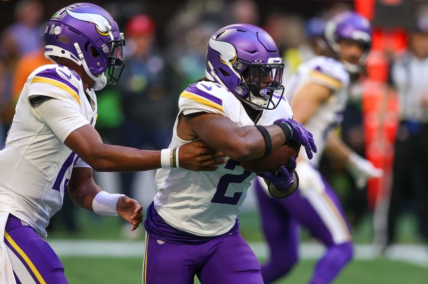 Minnesota Vikings running back Alexander Mattison (2) runs the ball against the Atlanta Falcons in the second half at Mercedes-Benz Stadium.