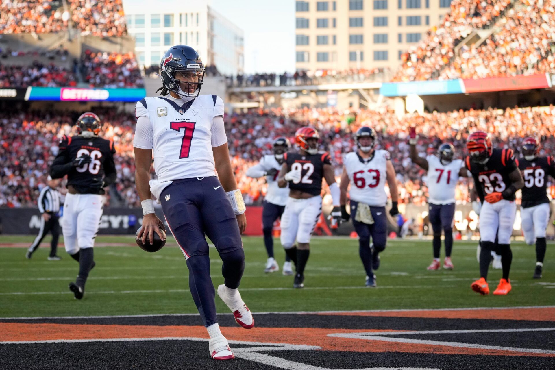 C.J. Stroud (7) runs into the end zone for a touchdown in the fourth quarter of the NFL Week 10 game between the Cincinnati Bengals and the Houston Texans at Paycor Stadium.