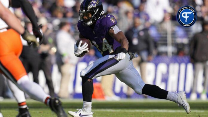 Baltimore Ravens RB Keaton Mitchell (34) runs the ball against the Cleveland Browns.