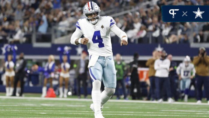 Dak Prescott (4) reacts after throwing a touchdown pass in the second quarter against the New York Giants at AT&T Stadium.