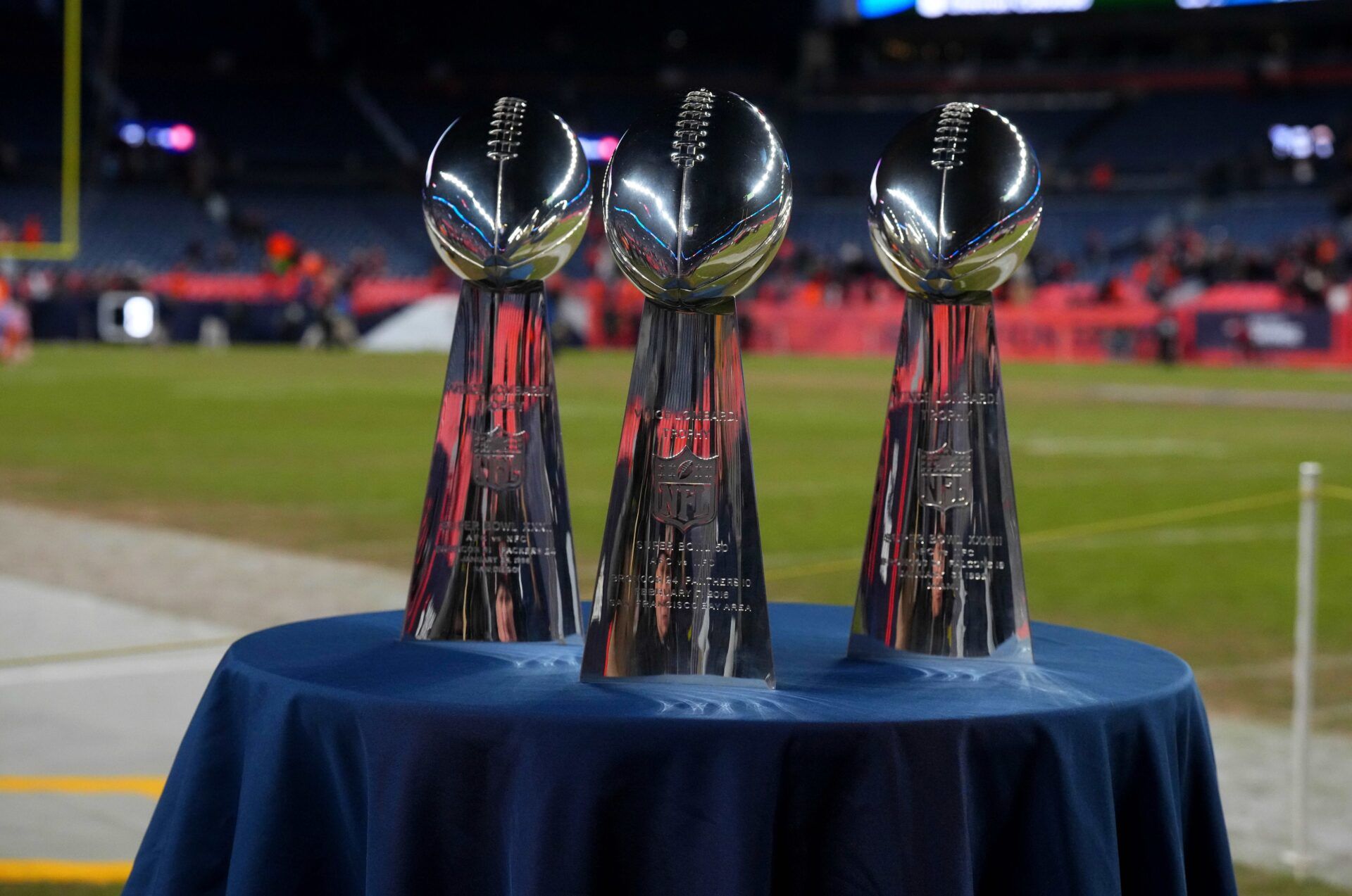 General view of three of the Denver Broncos past Super Bowl trophies on display following the win over the Arizona Cardinals at Empower Field at Mile High.