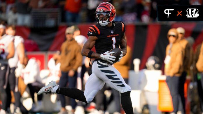 Cincinnati Bengals wide receiver Ja'Marr Chase (1) runs away with the ball on a touchdown reception in the third quarter of the NFL Week 10 game between the Cincinnati Bengals and the Houston Texans at Paycor Stadium in downtown Cincinnati on Sunday, Nov. 12, 2023.