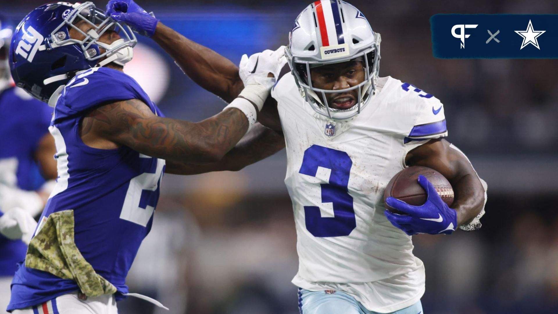 Brandin Cooks (3) stiff arms New York Giants safety Xavier McKinney (29) in the third quarter at AT&T Stadium.