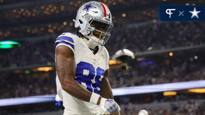 CeeDee Lamb (88) reacts after making a touchdown catch during the second half against the New York Giants at AT&T Stadium.