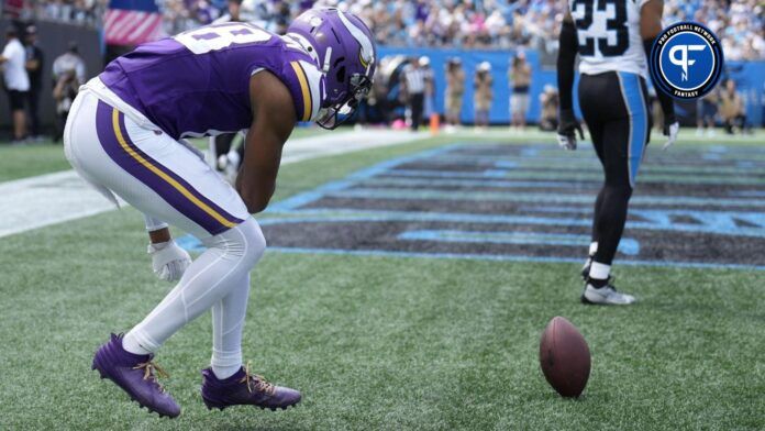 Minnesota Vikings WR Justin Jefferson (18) celebrates a touchdown against the Carolina Panthers.