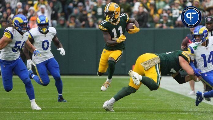 Green Bay Packers WR Jayden Reed (11) runs the ball against the Los Angeles Rams.