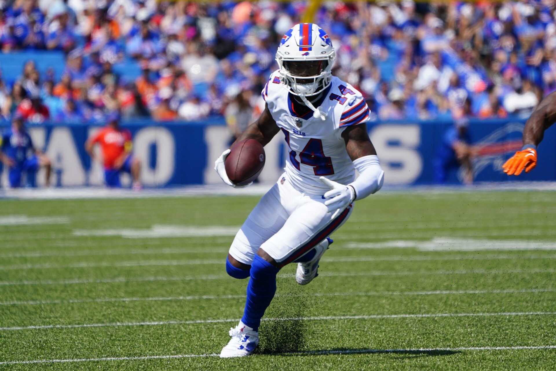 Buffalo Bills WR Stefon Diggs (14) runs with the ball after the catch against the Denver Broncos.