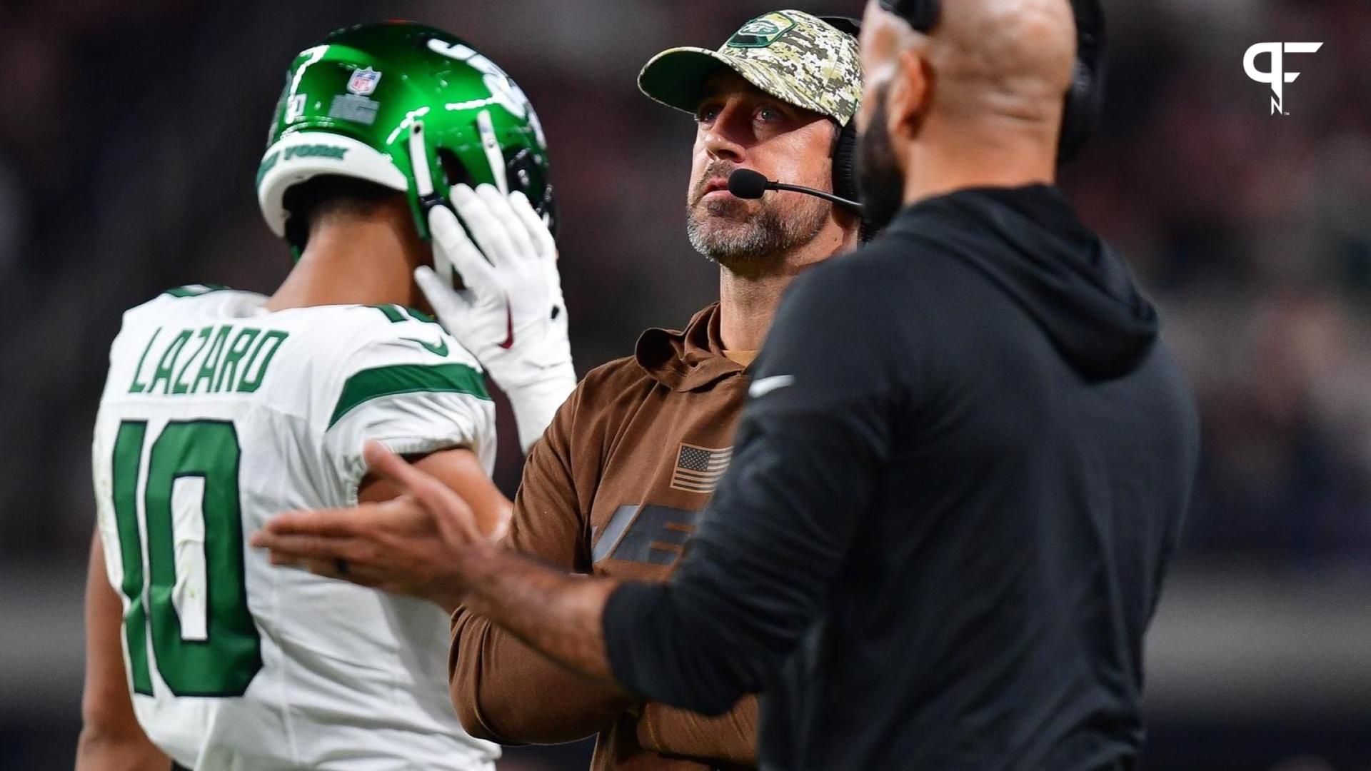 New York Jets quarterback Aaron Rodgers watches game action against the Las Vegas Raiders during the first half at Allegiant Stadium.