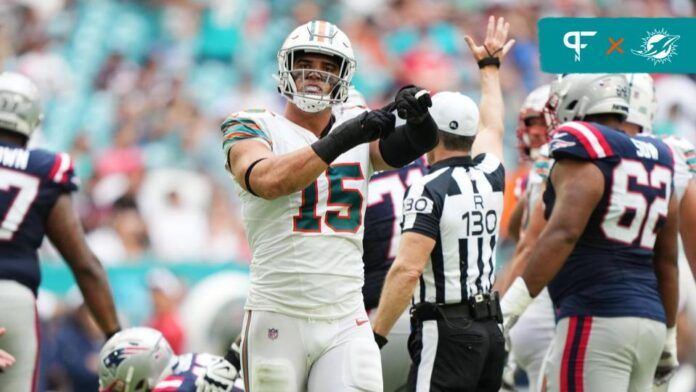 Jaelan Phillips (15) celebrates after sacking New England Patriots quarterback Mac Jones (10) during the second half at Hard Rock Stadium.