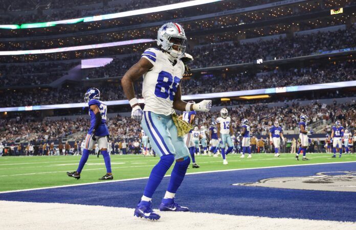 Dallas Cowboys wide receiver CeeDee Lamb (88) reacts after making a touchdown catch during the second half against the New York Giants at AT&T Stadium.