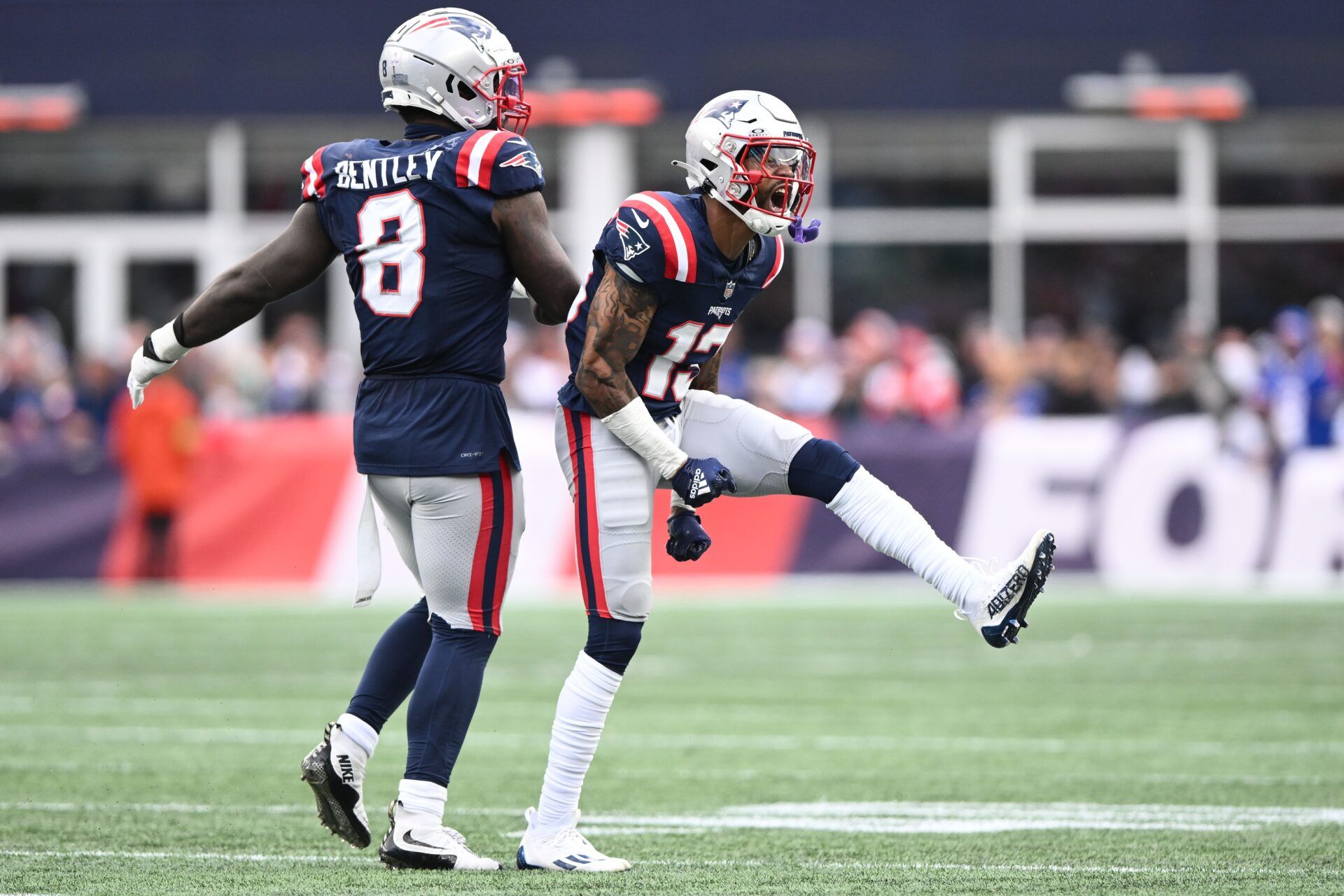 Jack Jones (13) reacts after making a tackles against the Buffalo Bills during the second half at Gillette Stadium.