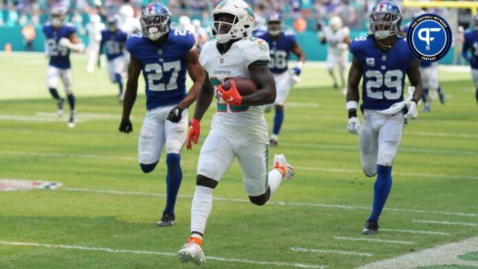 Miami Dolphins running back De'Von Achane (28) breaks free for a 76-yard touchdown run against the New York Giants during the first half of an NFL game at Hard Rock Stadium in Miami Gardens, October 8, 2023.