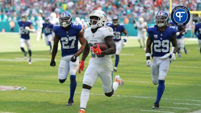 Miami Dolphins running back De'Von Achane (28) breaks free for a 76-yard touchdown run against the New York Giants during the first half of an NFL game at Hard Rock Stadium in Miami Gardens, October 8, 2023.