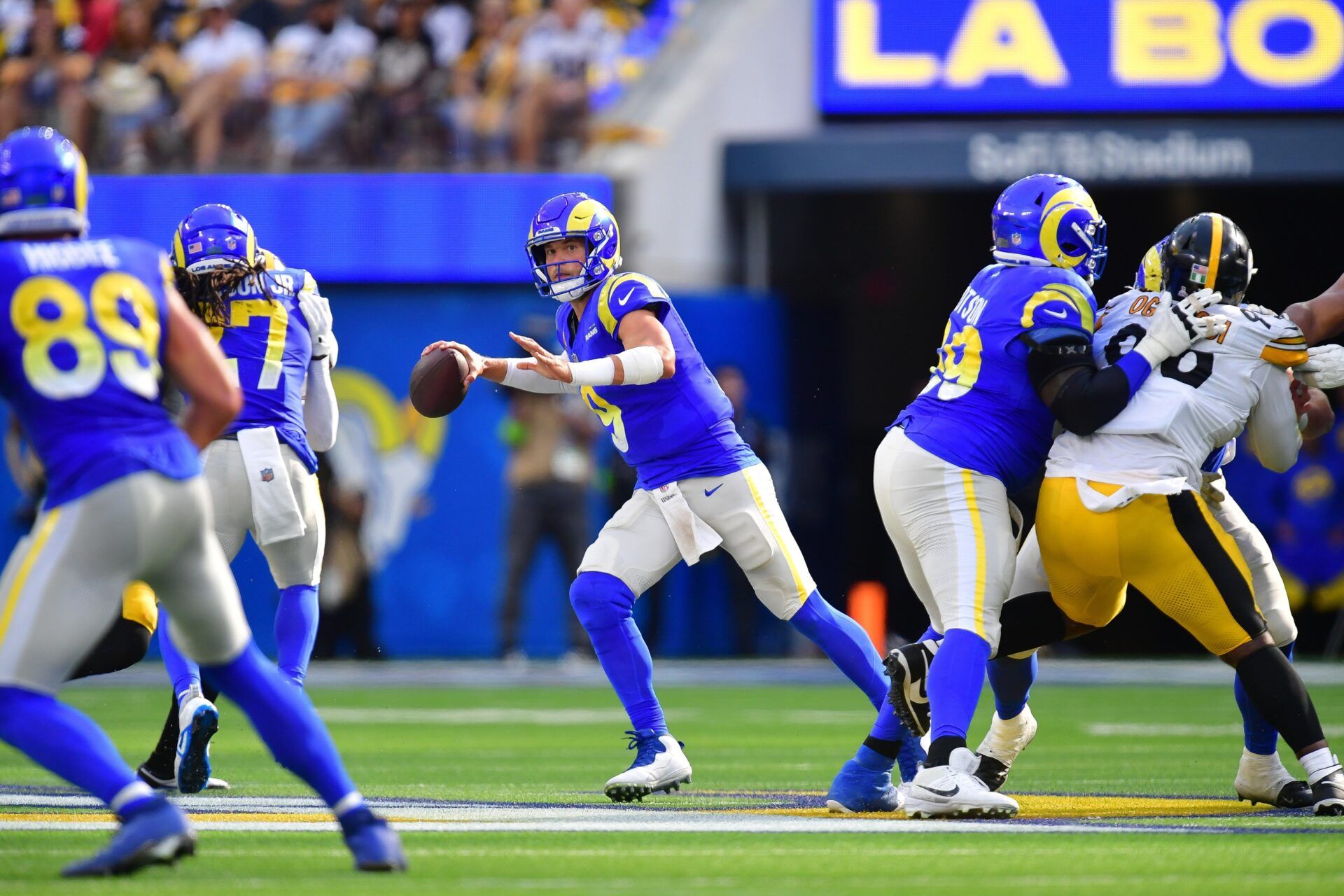 Los Angeles Rams quarterback Matthew Stafford (9) drops back to pass against the Pittsburgh Steelers during the second half at SoFi Stadium.