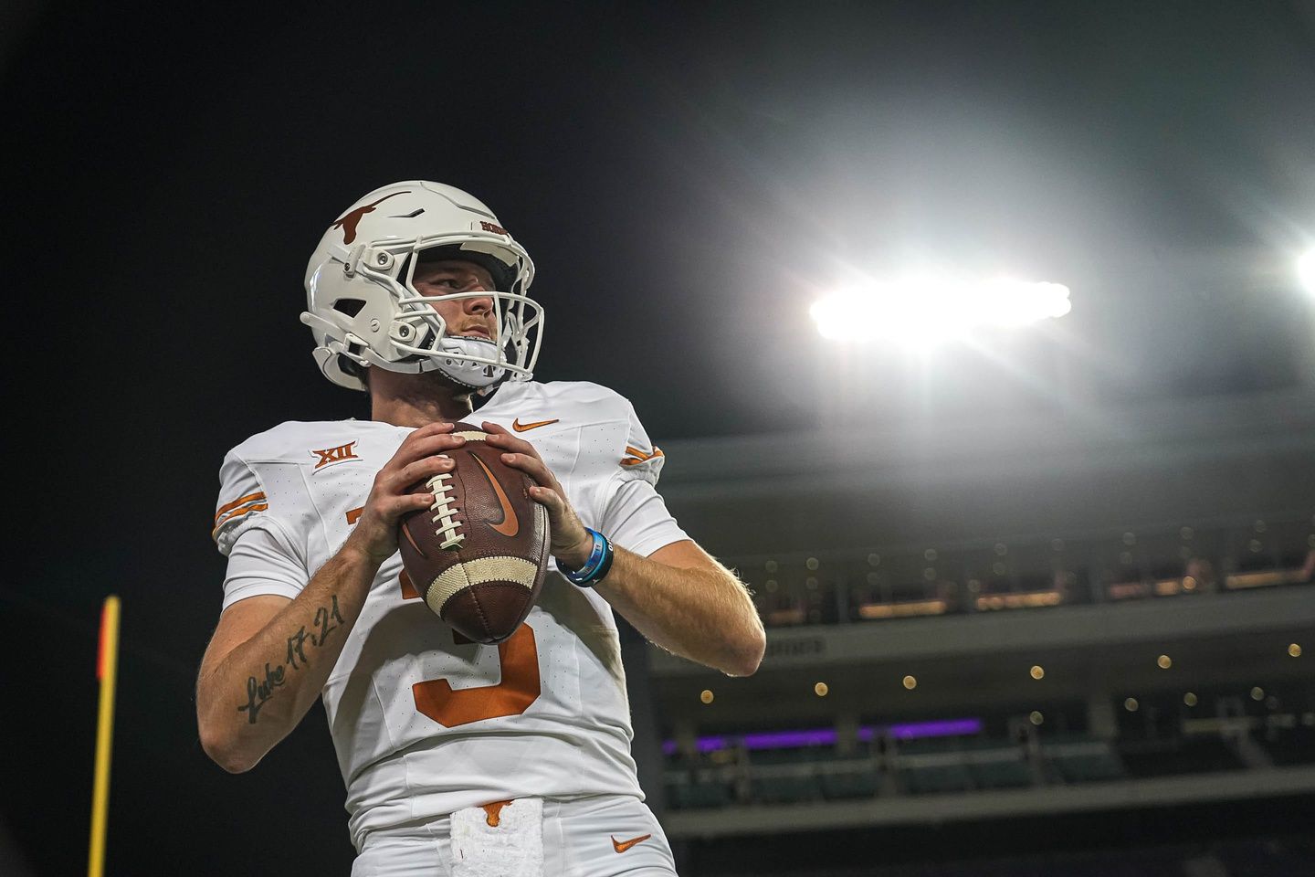 Texas Longhorns quarterback Quinn Ewers (3) warms up ahead of the game against TCU.