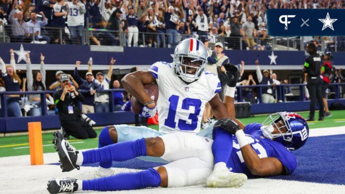 Dallas Cowboys wide receiver Michael Gallup (13) makes a touchdown catch past New York Giants cornerback Tre Hawkins III (37) during the second half at AT&T Stadium.