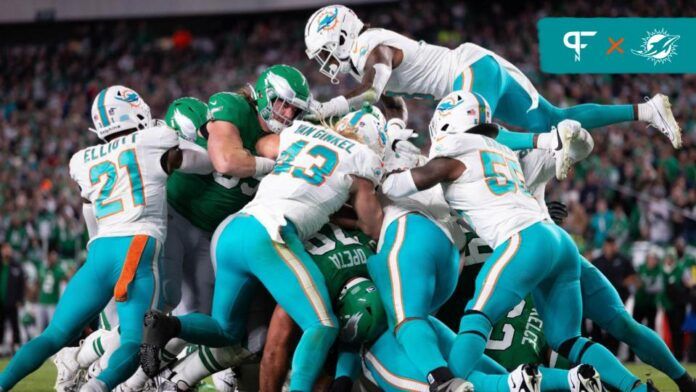 Philadelphia Eagles quarterback Jalen Hurts (1) scores on a quarterback sneak on the one yard line against the Miami Dolphins during the second quarter at Lincoln Financial Field.