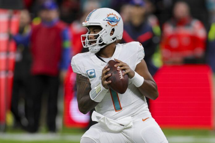 Miami Dolphins quarterback Tua Tagovailoa (1) drops back to pass against the Kansas City Chiefs in the first quarter during an NFL International Series game at Deutsche Bank Park.