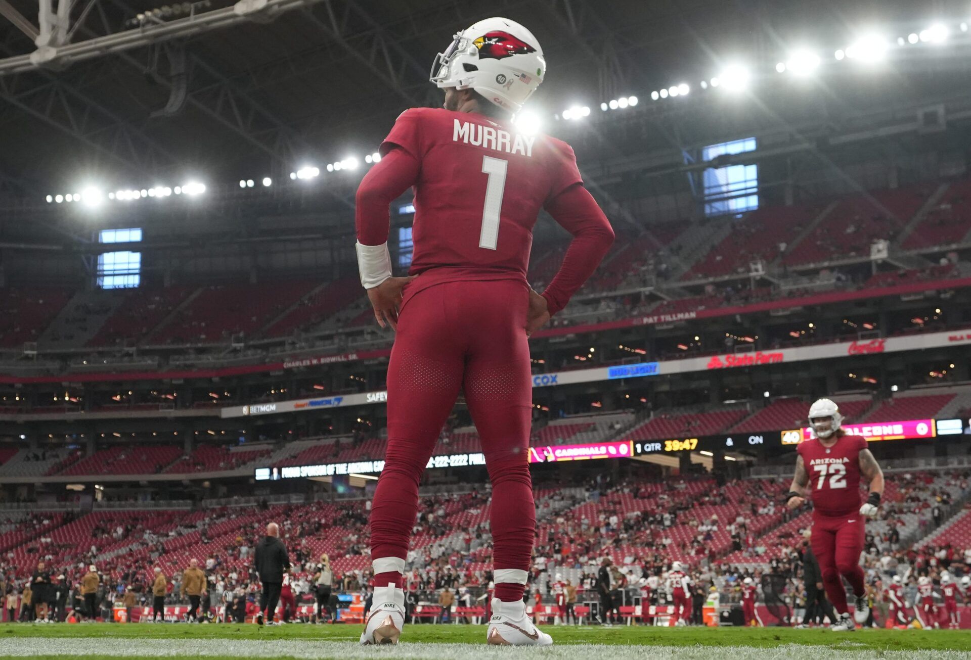 Arizona Cardinals quarterback Kyler Murray (1) warms up before their game against the Atlanta Falcons at State Farm Stadium in Glendale on Nov. 12, 2023.