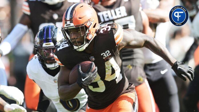 Cleveland Browns running back Jerome Ford (34) runs with the ball during the second half against the Baltimore Ravens at Cleveland Browns Stadium.