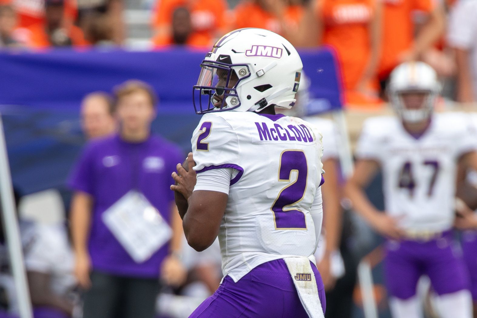 James Madison Dukes quarterback Jordan McCloud (2) looks for a pass to an open player during the second half of the game against the Virginia Cavaliers at Scott Stadium.