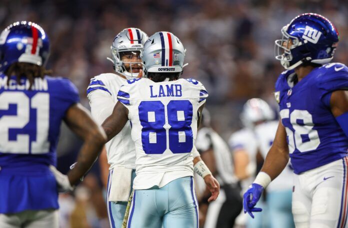 Dallas Cowboys WR CeeDee Lamb (88) and QB Dak Prescott (4) react after a touchdown against the New York Giants.