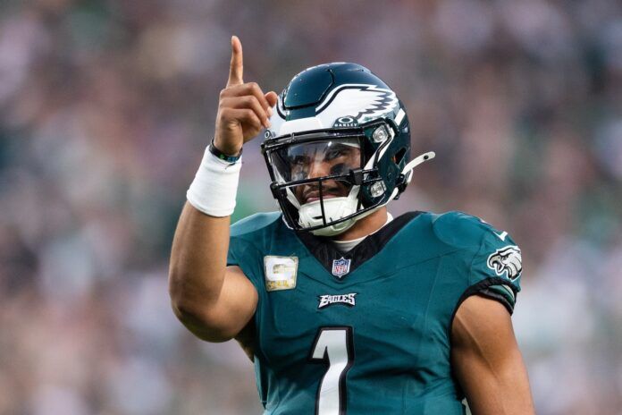 Jalen Hurts (1) reacts after a touchdown against the Dallas Cowboys during the first quarter at Lincoln Financial Field.