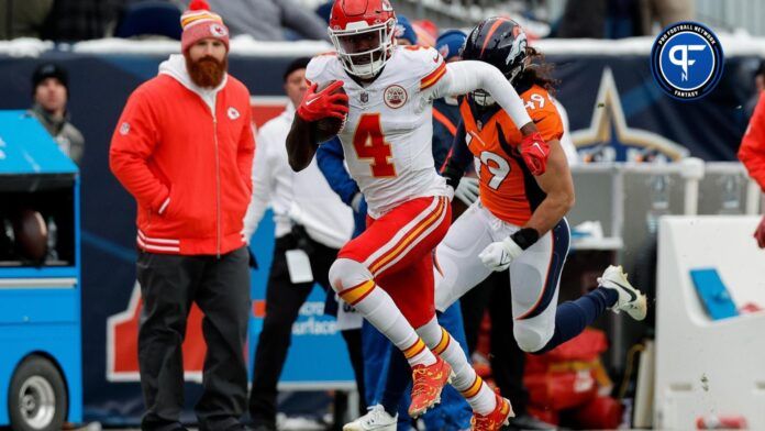 Kansas City Chiefs WR Rashee Rice (4) runs with the ball against the Denver Broncos.