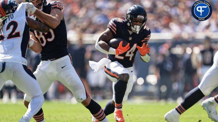 Khalil Herbert (24) runs with the ball against the Denver Broncos at Soldier Field.