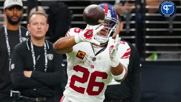 Saquon Barkley (26) looks to make a reception against the Las Vegas Raiders during the first quarter at Allegiant Stadium.