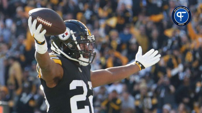 Pittsburgh Steelers running back Najee Harris (22) reacts after scoring a touchdown against the Green Bay Packers during the first quarter at Acrisure Stadium.