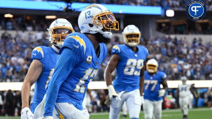 Keenan Allen (13) celebrates after scoring a touchdown against the Detroit Lions during the second half at SoFi Stadium.