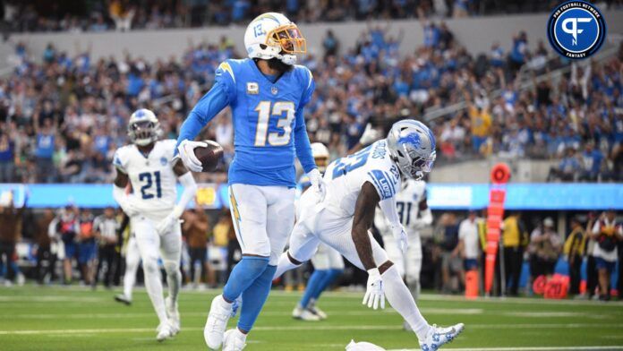 Keenan Allen (13) celebrates after scoring a touchdown against the Detroit Lions during the first half at SoFi Stadium.