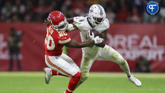 Miami Dolphins running back Raheem Mostert (31) holds off Kansas City Chiefs safety Justin Reid (20) in the fourth quarter during an NFL International Series game at Deutsche Bank Park.