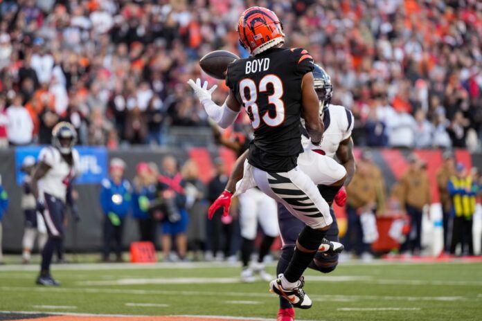 Cincinnati Bengals wide receiver Tyler Boyd (83) bobbles a pass in the end zone in the fourth quarter of the NFL Week 10 game between the Cincinnati Bengals and the Houston Texans at Paycor Stadium in downtown Cincinnati on Sunday, Nov. 12, 2023.