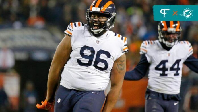 Chicago Bears defensive end Akiem Hicks (96) reacts after sacking Minnesota Vikings quarterback Kirk Cousins (not pictured) during the second half at Soldier Field.