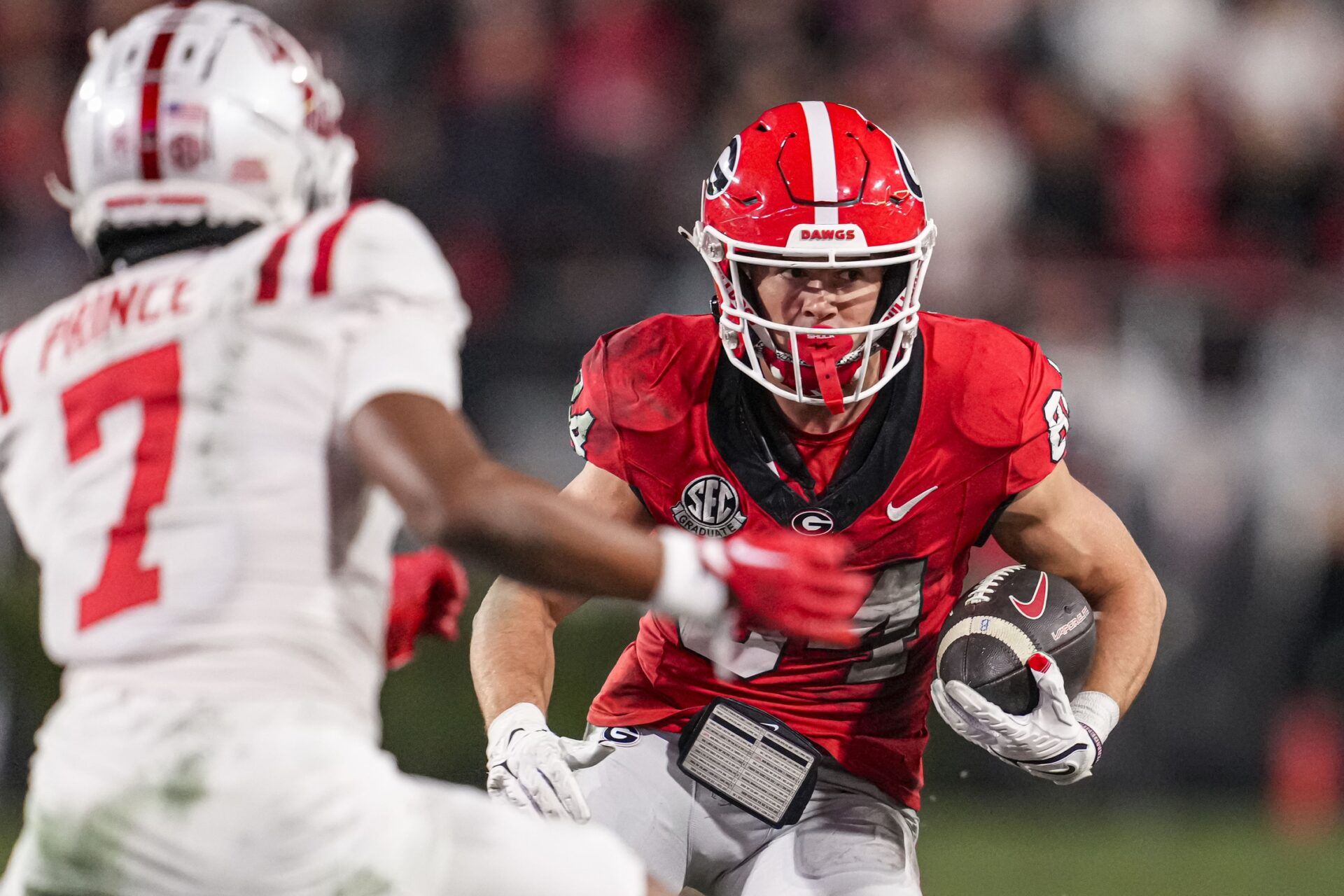 Georgia Bulldogs WR Ladd McConkey (84) runs after the catch against Ole Miss.