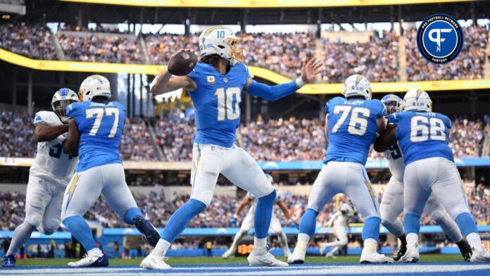 Los Angeles Chargers quarterback Justin Herbert (10) throws a pass against the Detroit Lions during the first half at SoFi Stadium.