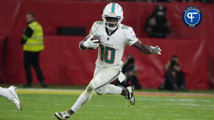 Miami Dolphins wide receiver Tyreek Hill (10) carries the ball against the Kansas City Chiefs in the second half during an NFL International Series game at Deutsche Bank Park.