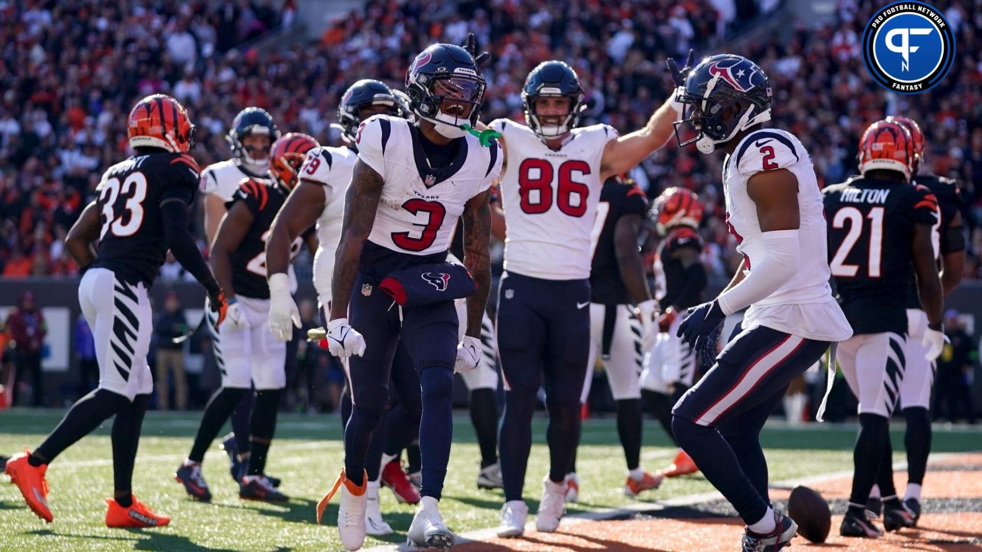 Tank Dell (3) celebrates a touchdown catch in the second quarter of a Week 10 NFL football game between the Houston Texans and the Cincinnati Bengals at Paycor Stadium.