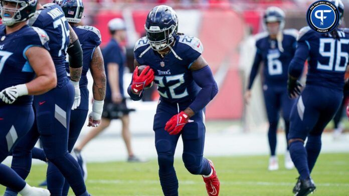 Derrick Henry (22) runs the ball before a game against the Tampa Bay Buccaneers at Raymond James Stadium.