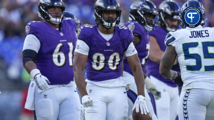 Baltimore Ravens TE Isaiah Likely (90) celebrates after a first down against the Seattle Seahawks.