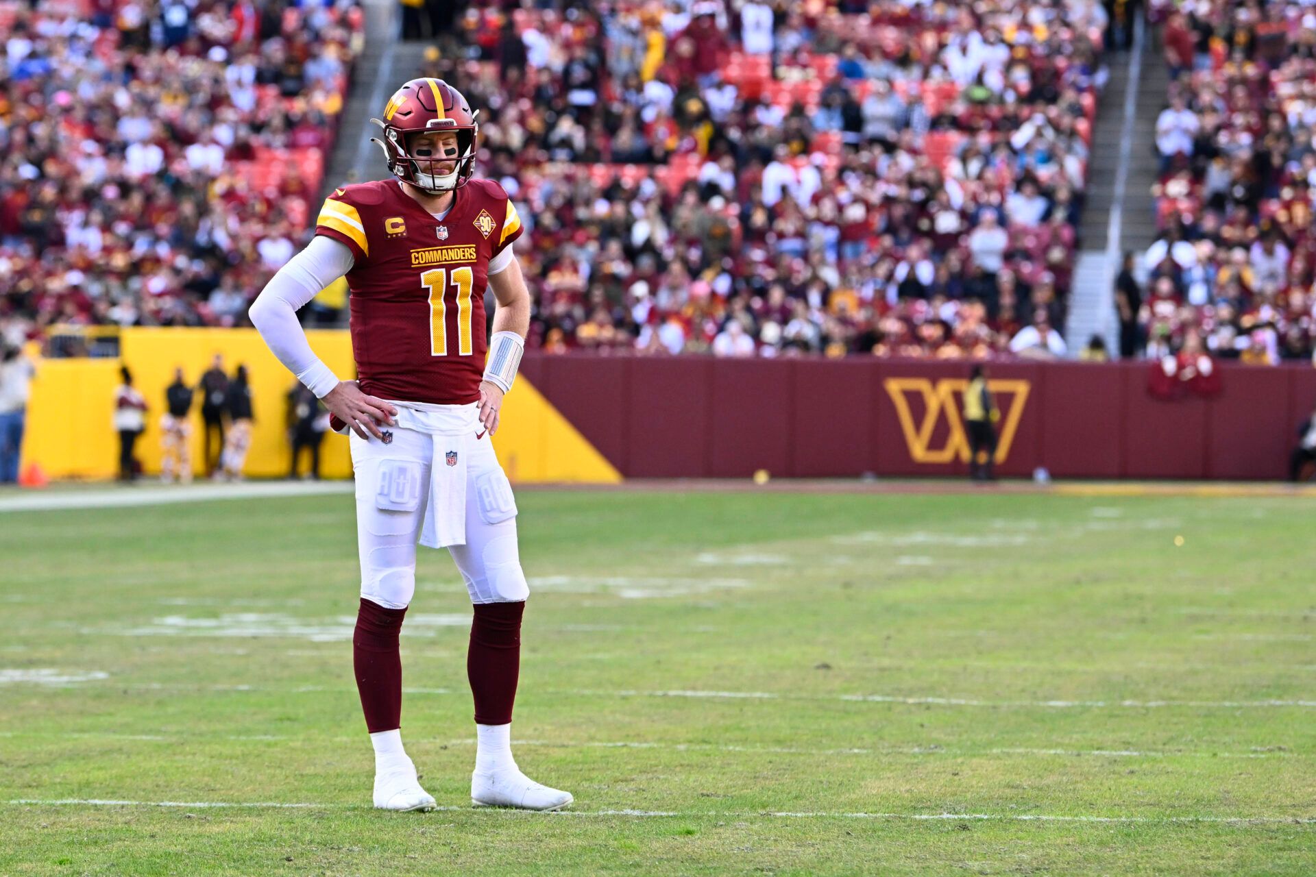 Washington Commanders quarterback Carson Wentz (11) looks on against the Cleveland Browns during the first half at FedExField.