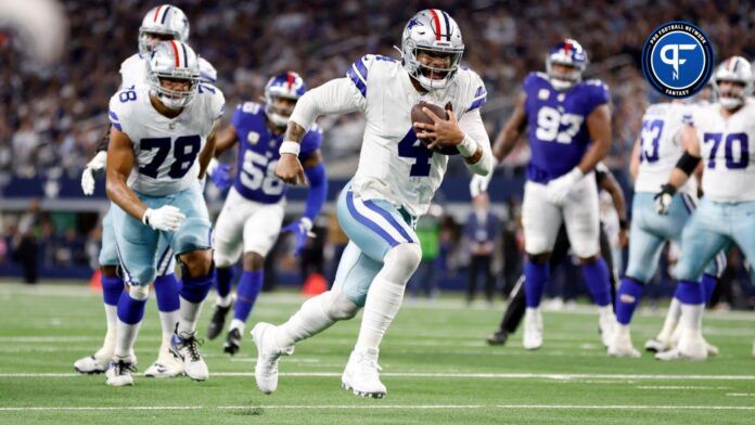 Dallas Cowboys quarterback Dak Prescott (4) runs for a touchdown in the second quarter against the New York Giants at AT&T Stadium.