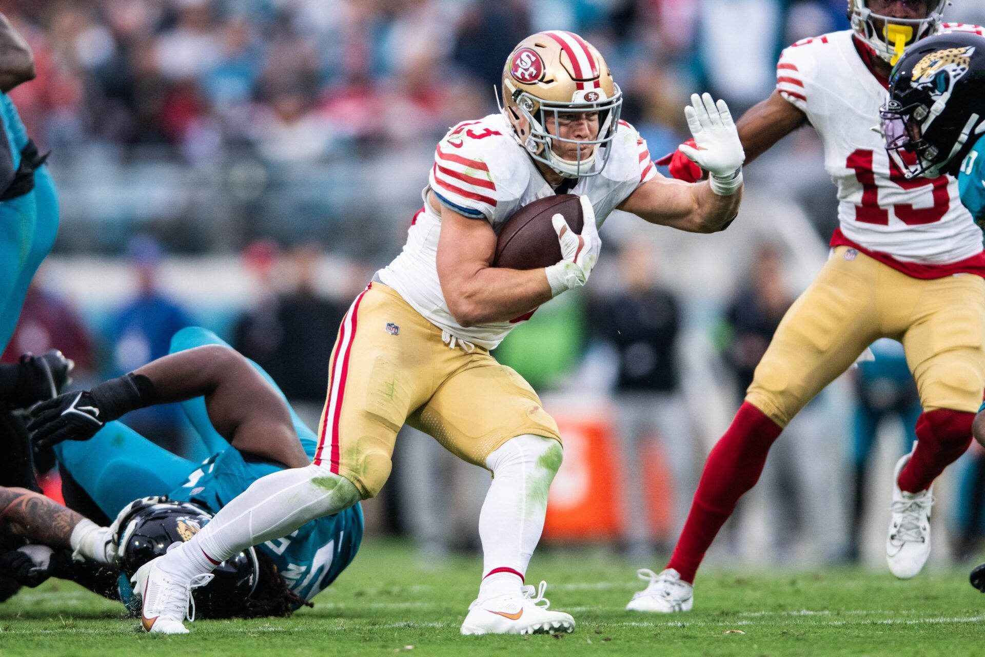 San Fransisco 49ers running back Christian McCaffrey runs the ball against the Jacksonville Jaguars in the third quarter at EverBank Stadium.