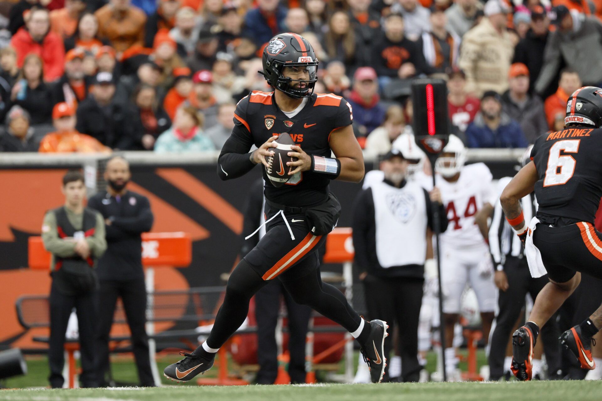 DJ Uiagalelei (5) looks to throw during the first half against the Stanford Cardinal at Reser Stadium.