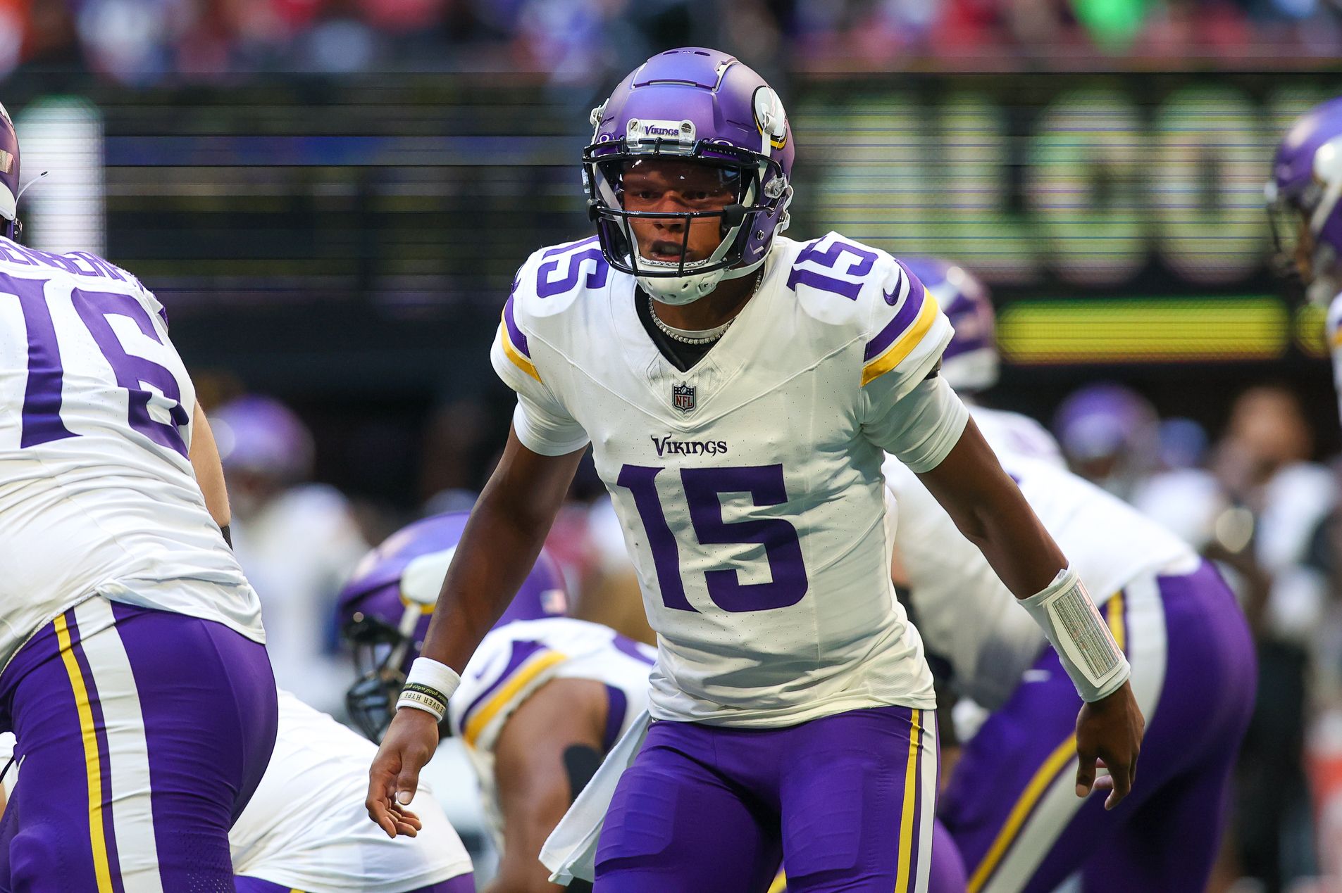 Minnesota Vikings quarterback Joshua Dobbs (15) calls a play against the Atlanta Falcons in the first half at Mercedes-Benz Stadium.