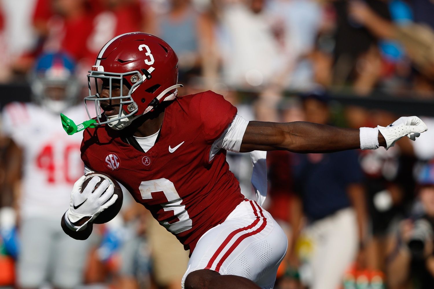 Terrion Arnold (3) carries the ball after an interception against the Mississippi Rebels during the second half of a football game at Bryant-Denny Stadium.