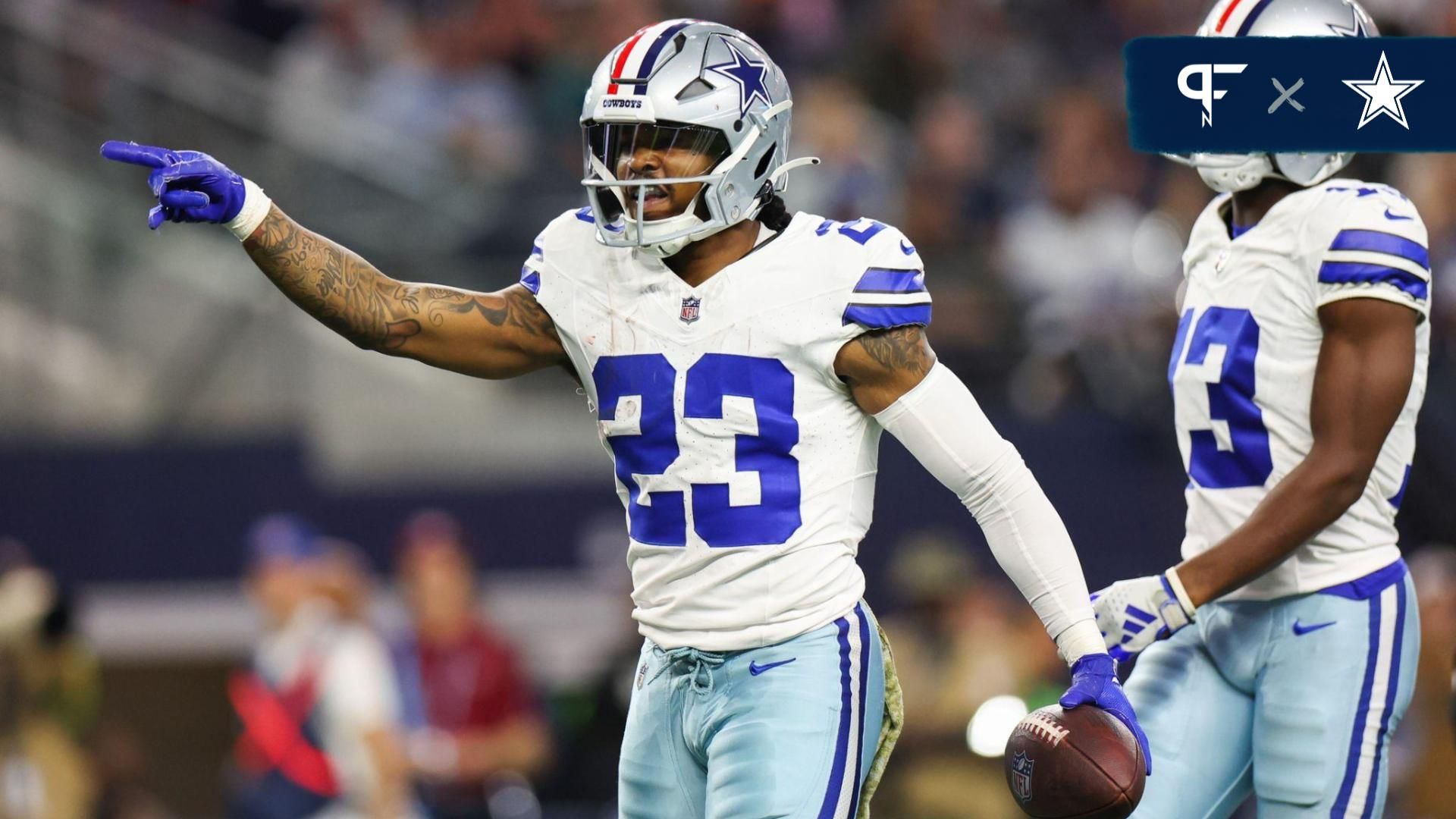 Rico Dowdle (23) reacts during the first half against the New York Giants at AT&T Stadium.