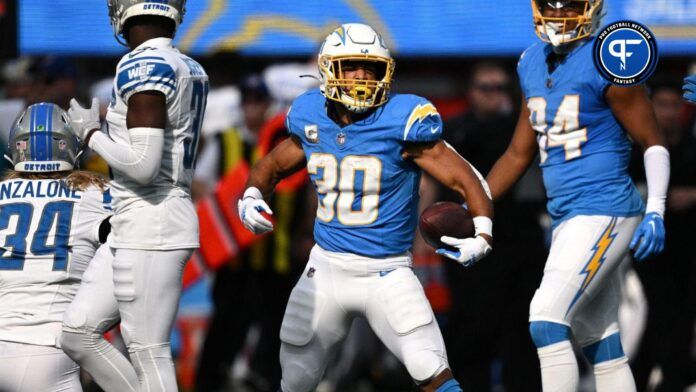 Austin Ekeler (30) reacts after a first down against the Detroit Lions during the first half at SoFi Stadium.